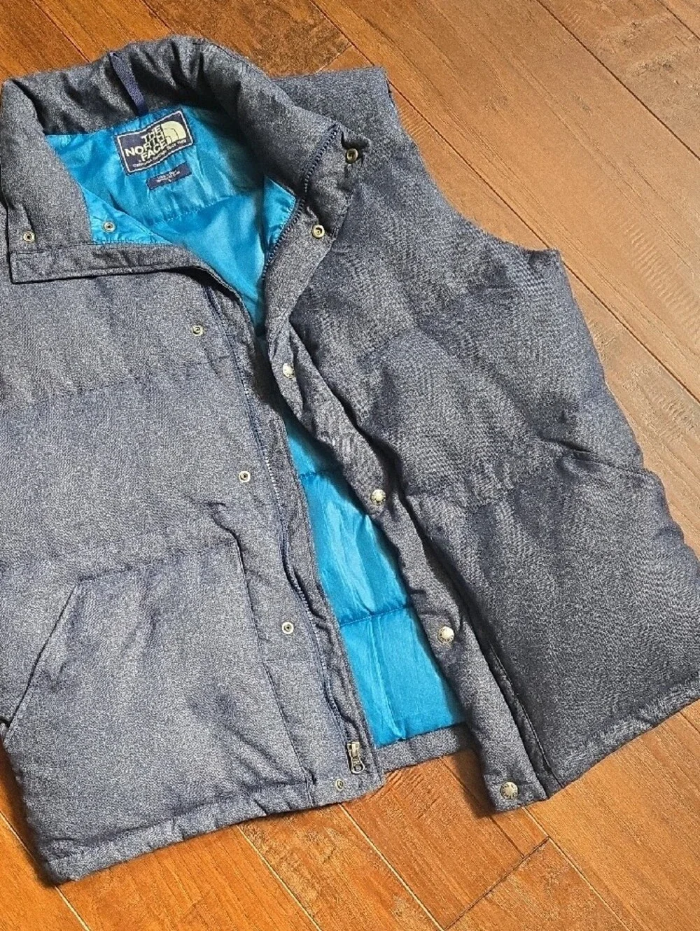 The North Face Men’s Heather Navy Puffer Vest with Bright Blue Lining Large
